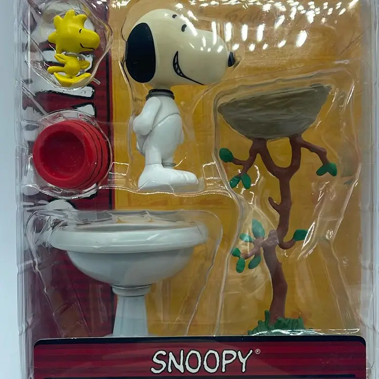 Peanuts Snoopy and Woodstock figure made by memory lane new in the box. Largest piece is 5 inches.
