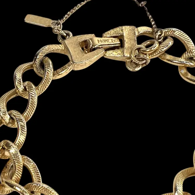 Vintage 7” Monet Gold-tone Textured Link Bracelet. Signed MONET. Security Chain also Signed.