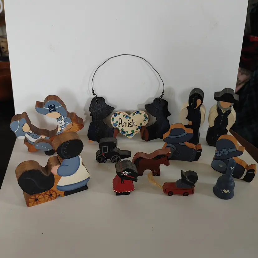 Set of Amish wood figurines.