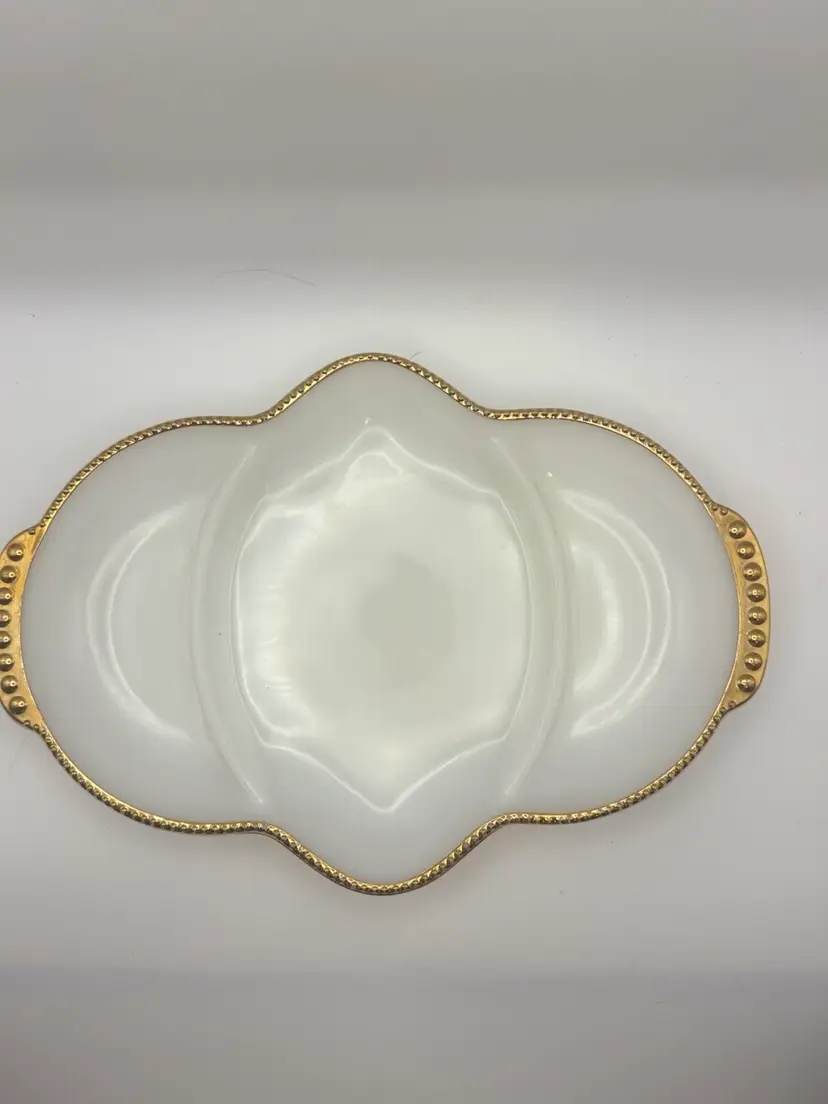 Vintage Anchor Hocking Fire-King milk glass divided relish tray with gold beaded trim.