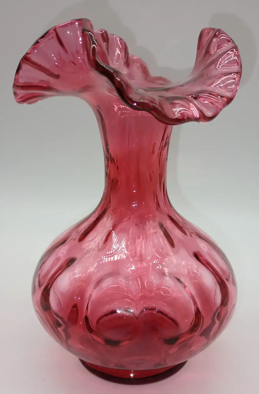 This Fenton Art Glass Vase Is A Gorgeous Cranberry Color With A Reverse Thumbprint Pattern. This Art Glass Piece Measures 8.5 Inches Tall And 6 Inches Wide.
Great Pieces To Add To Your Fenton Collection. Excellent Condition.