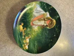 Porcelain collector plate titled 'Golden
Moment' by Donald Zolan