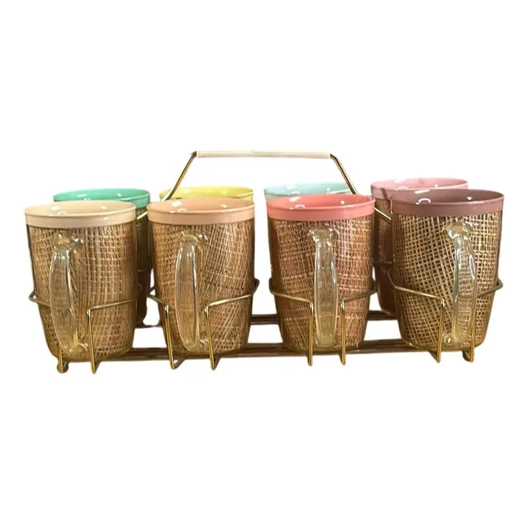 Eight MCM Thermal Raffiaware Mugs with Goldtone Metal Holder