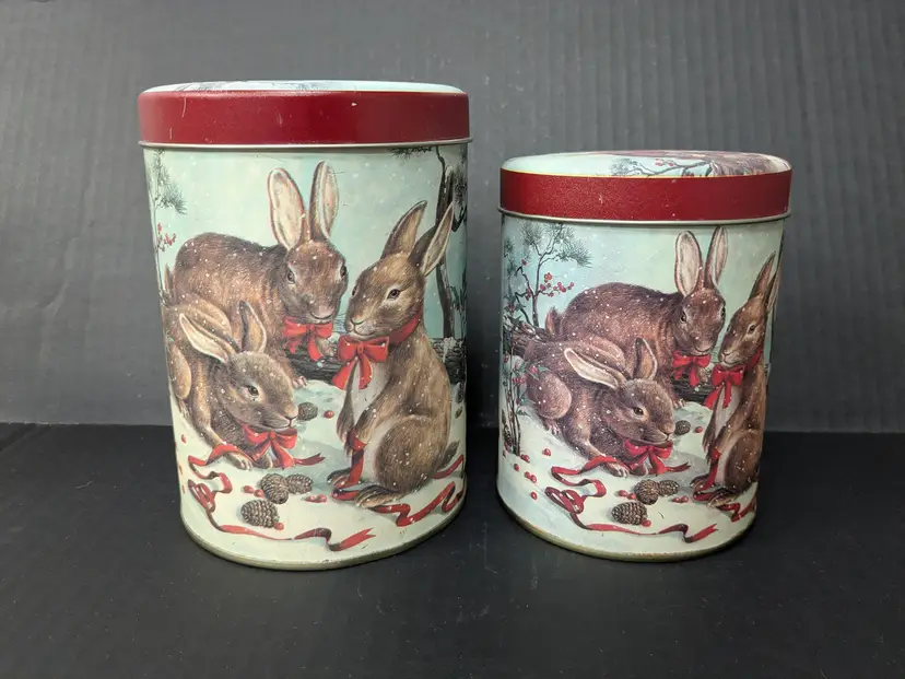 Decorative tin metal canisters bunnies playing in the snow holidays made in Taiwan.