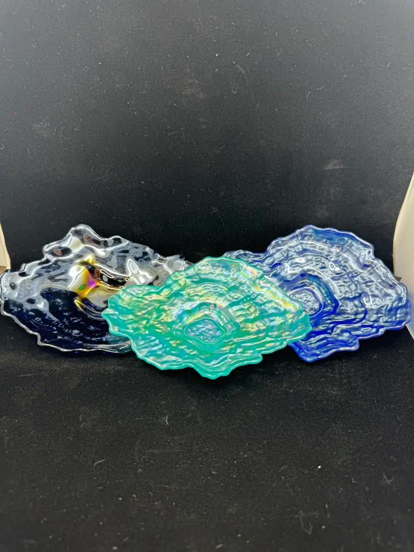 Set of three free-form iridescent art glass dishes
