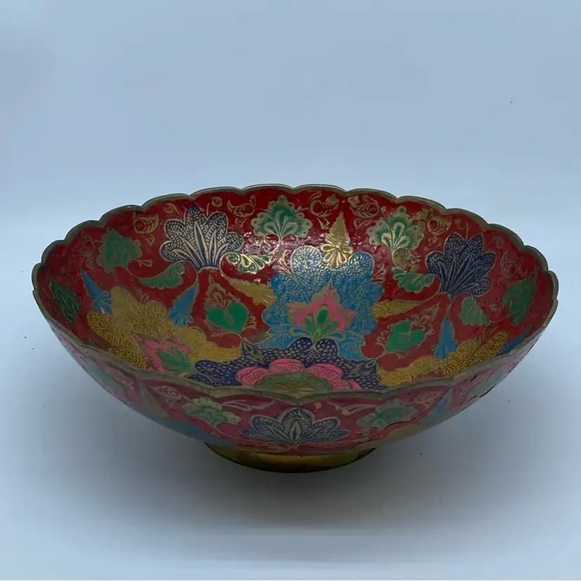 #3531 A vintage enameled brass decorative bowl with floral and peacock motifs.