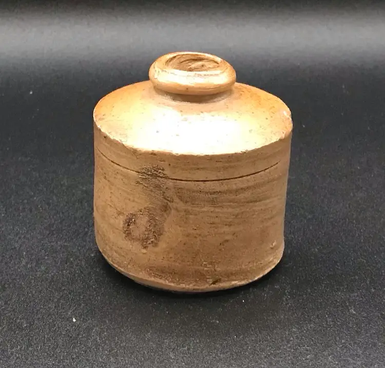 Tiny primitive crock