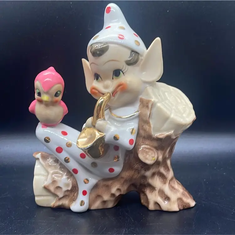 Pixie On A Log With Birdie