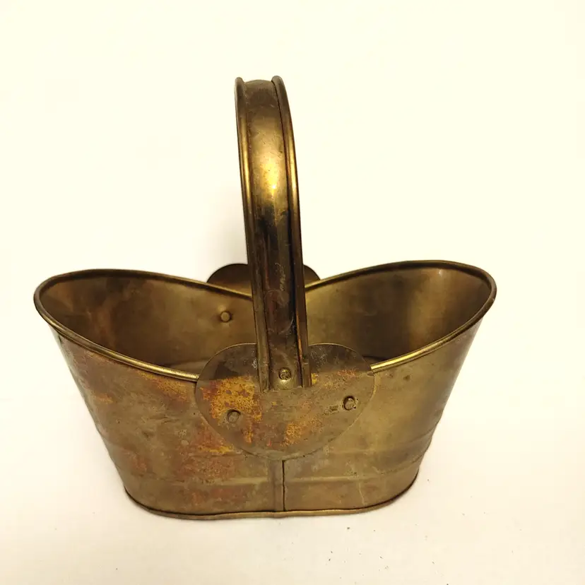 Brass basket. Nice patina. Made in India. 6.5w x 6h x 4.25d.
