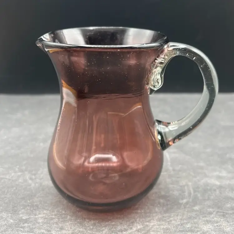 #233B Vintage Hand Blown Open Creamer Pitcher In a Smokey-Purple Color With a Clear Applied Handle. Not Signed