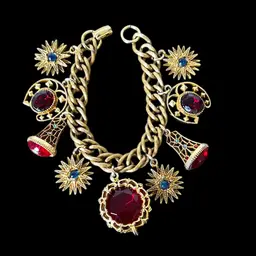 #14 - Vintage Victorian Revival gold-tone charm bracelet with faux ruby and sapphire details.