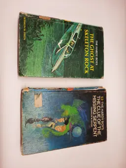 #01 - Lot of 2 Hardy Boys Hardcover Books "The Clue of the Hissing Serpent" and "The Ghost at Skeleton Rock"