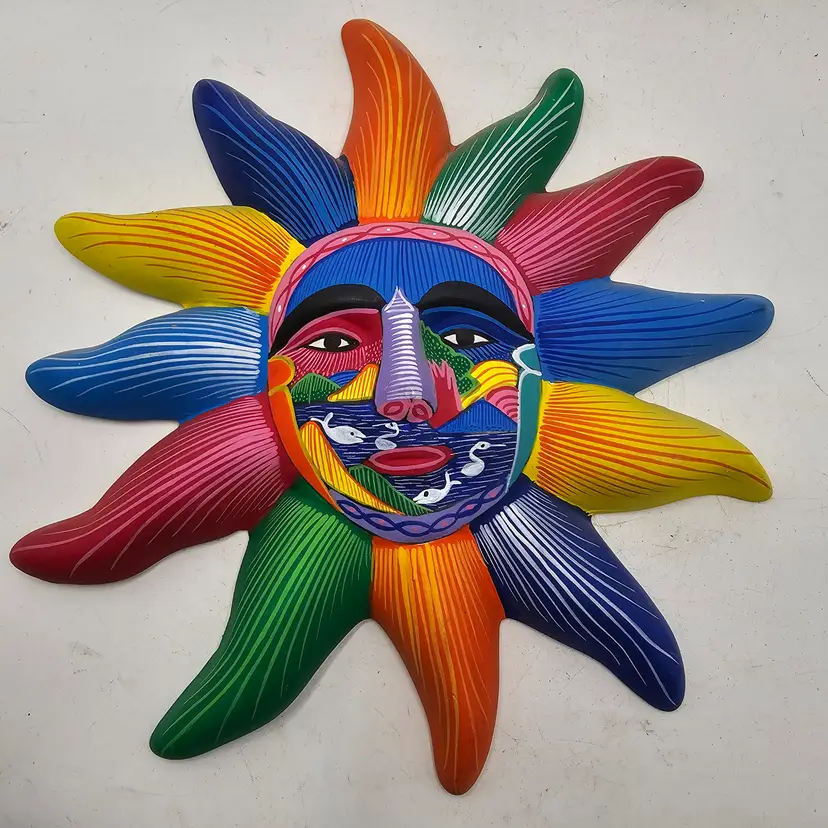Art Pottery sun face wall hanging with dolphins handmade