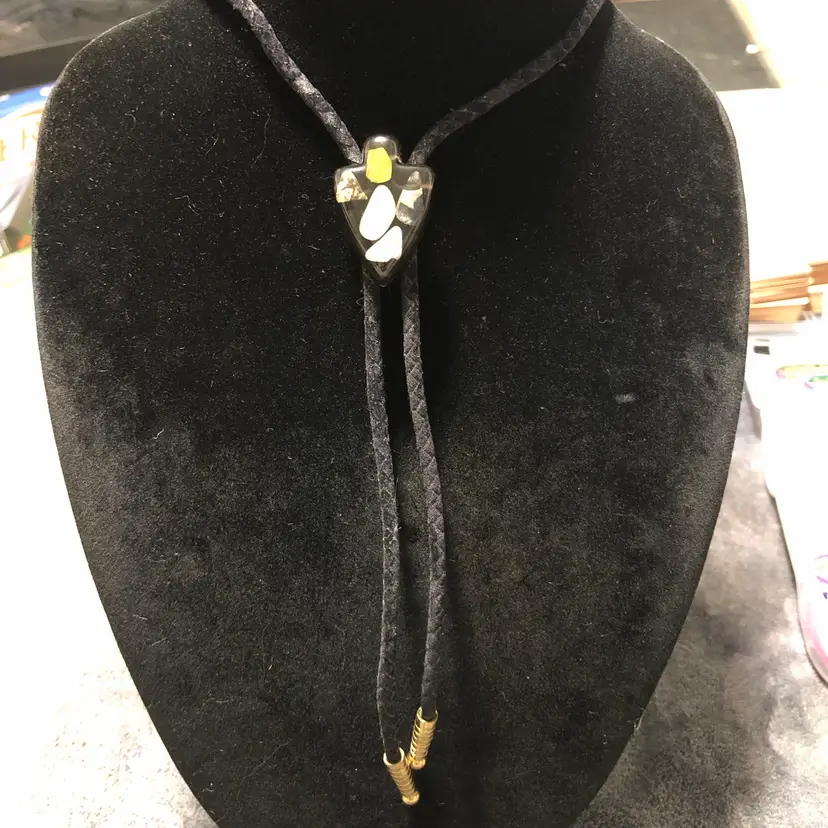 Lucite Arrowhead with Stones with Gold-Tone Accents and Black Cord Bolo Tie