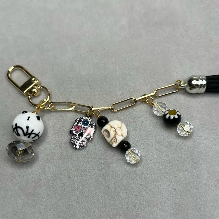 Halloweenish Purse/backpack Charm “skulls”