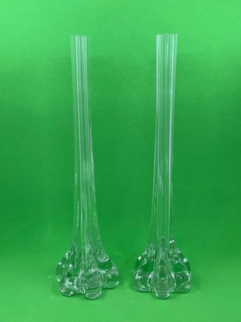 Pair of clear glass vases with fluted stems and bulbous bases
