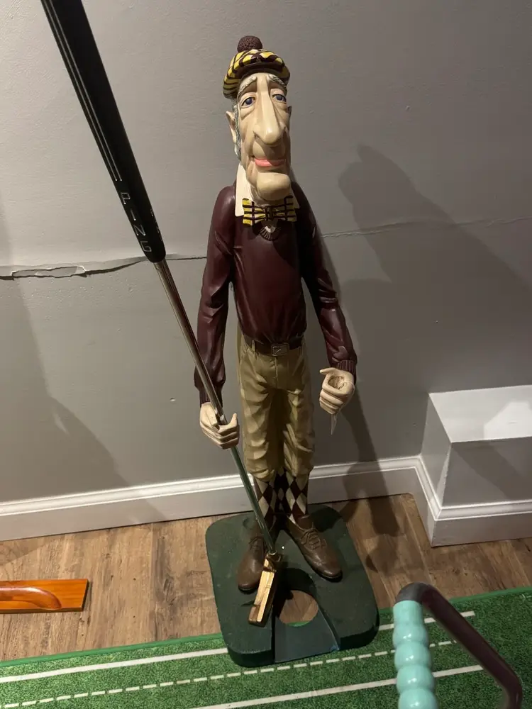 Old Golfer Statue