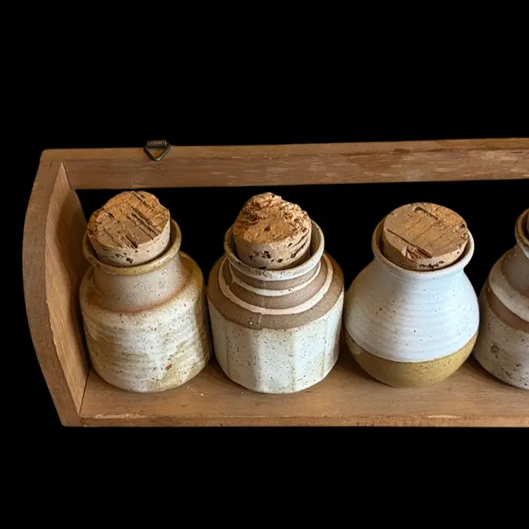 Wooden Hanging Shelf with Six Pottery Jars with Cork Lids