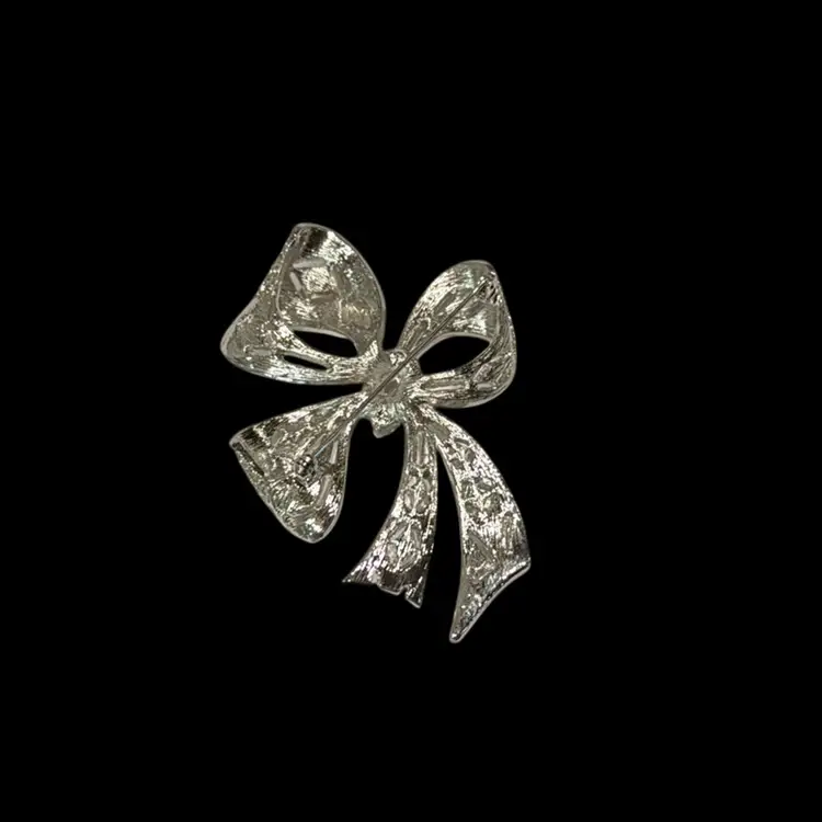 Kenneth Jay Lane KJL Signed Silvertone & Rhinestone Bow Brooch - 3.25”