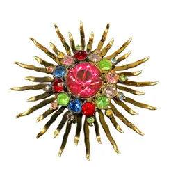 Multicolored Starburst Rhinestone Brooch. Unsigned