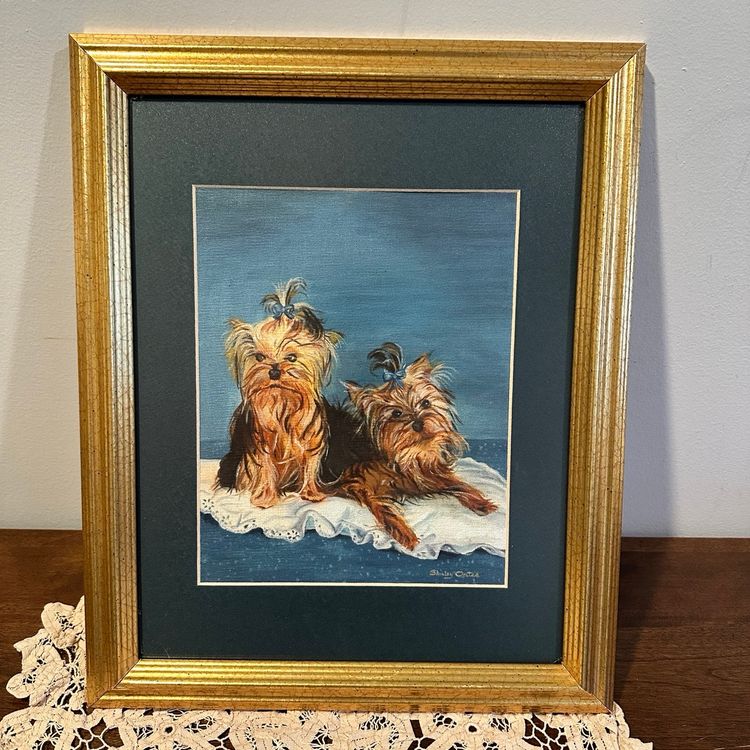 Adorable original painting of 2 Yorkshire Terriers From 1999 Signed by Shirley Oates.  Beautifully Mastered and framed in a Gold frame.  These adorable faces make you want to pick them up and snuggle them!! Size: 16” x 13”