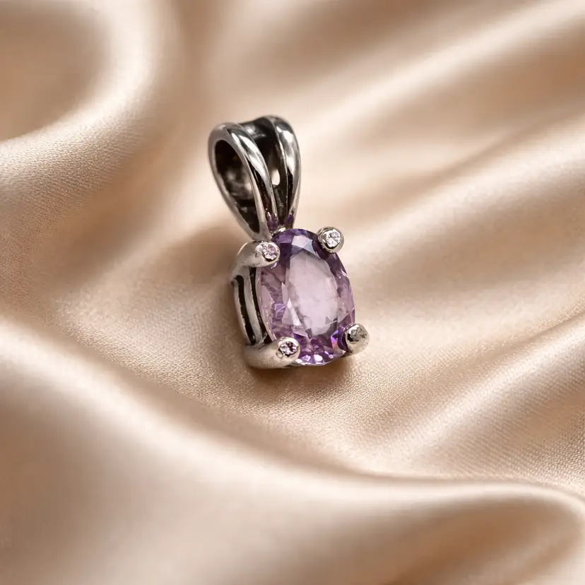 Sterling Silver & Amethyst Pendant with a Prong Set Stone, .25"