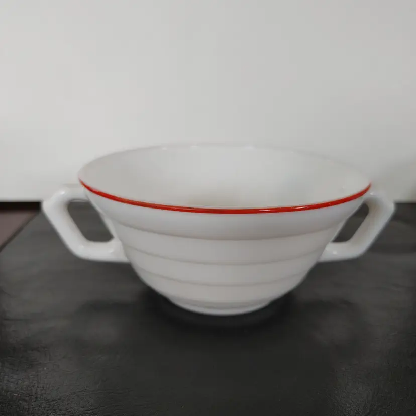 Hazel Atlas Moderntone Platonite milk glass Bowl with Red rim. 6.5w x 2.5h x 5.75d. 1930-1940.