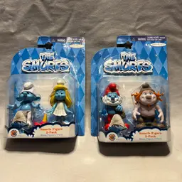 Lot of 2 Packs of The Smurfs Movie Clumsy & Smurfette / Papa Smurf & Hackus NIB