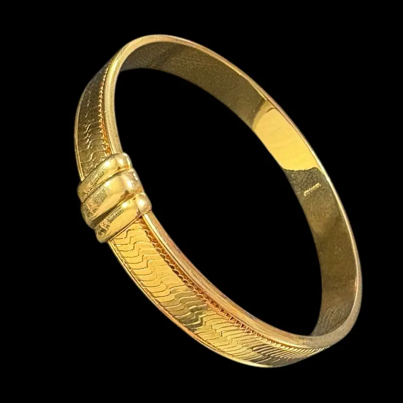 41. Vintage Monet Goldtone Bangle