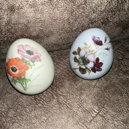 Hand painted Floral Ceramic Eggs Set of 2 One Green One Blue