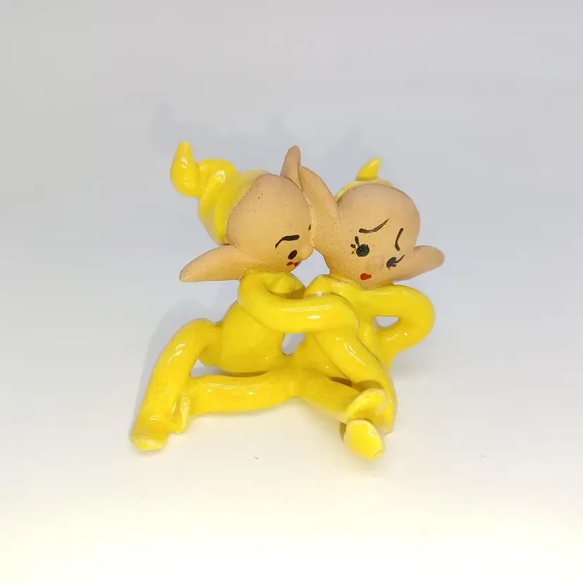Vintage Hugging Tumbling Elves Figurine yellow Circa 1950s rare