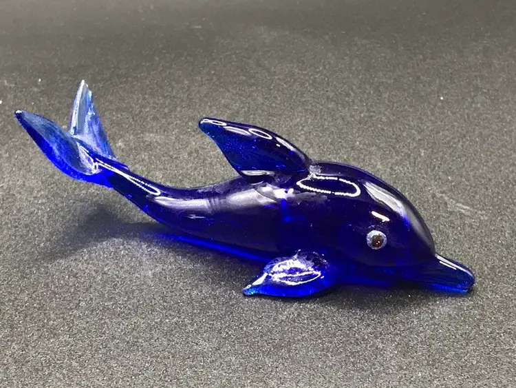 Tiny glass cobalt blue fish