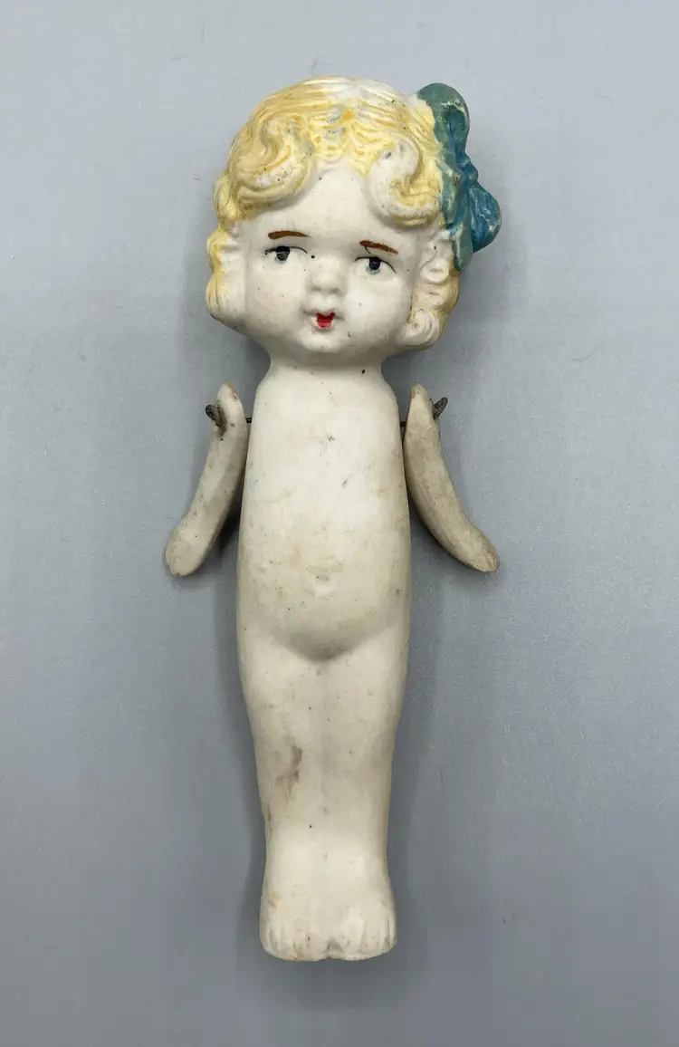 Made in Japan Bisque Doll with Blonde Hair and Blue Bow / Jointed Arms and Frozen Legs / Vintage