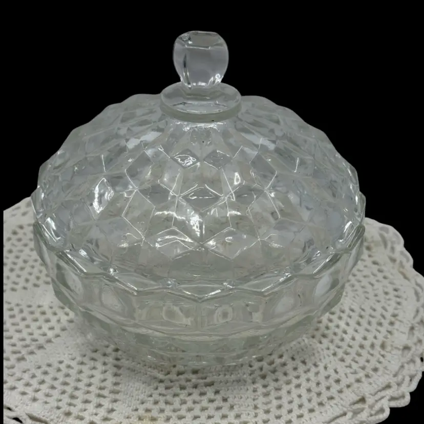 Clear glass covered candy dish in the Indiana Glass Whitehall pattern.