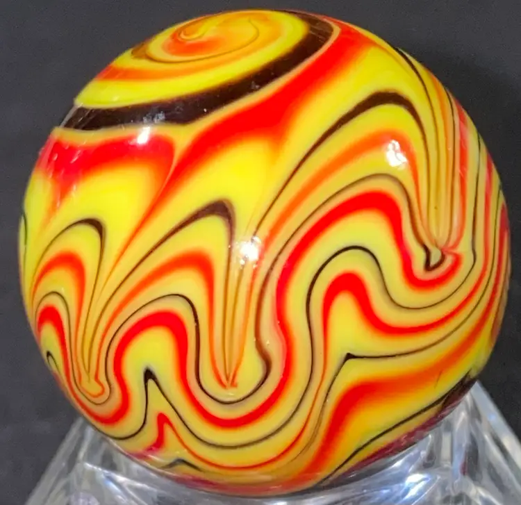 SALE- 25% Off 1 1/8" Signed Red Black Yellow  Marble  UV Glow Front And Back Photos (was $28)