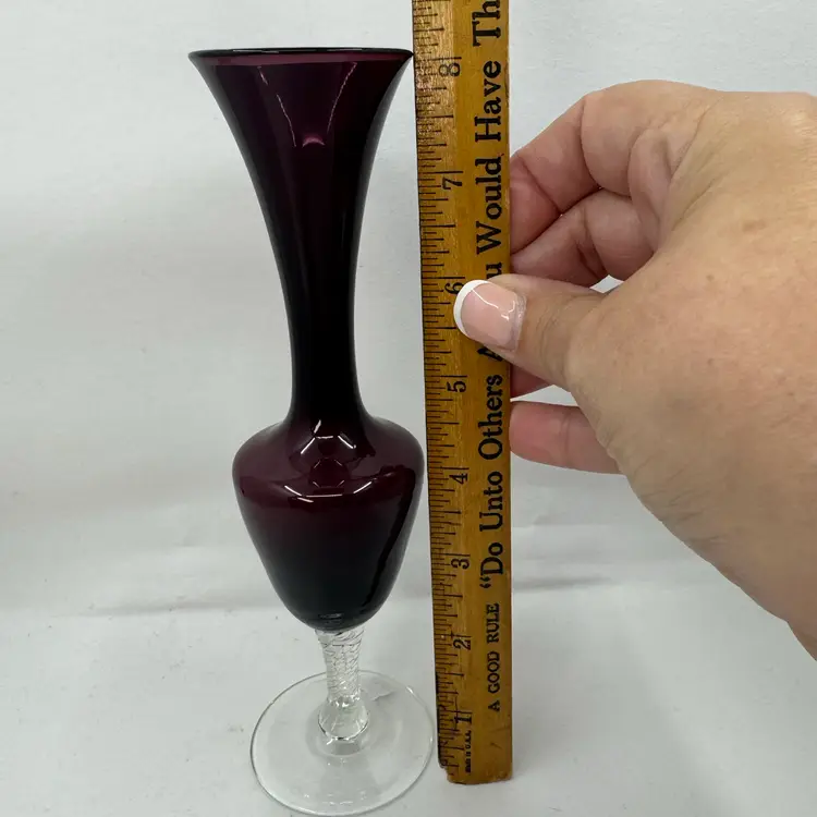 Vintage hand-blown amethyst glass bud vase with a clear twisted stem