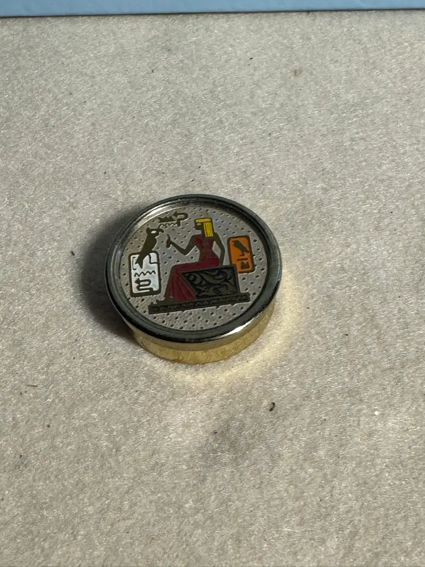 Vintage pill box with an Ancient Egyptian motif (brass And Enamel Possibly)