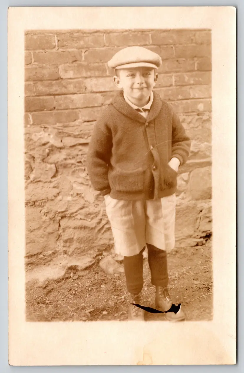 Postcard RPPC Boy with Scally Cap Hand in Pock of Sweater Coat Real Photo  - 9087