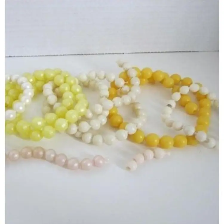 1950's POP BEADS - 176 beads in yellow, orange and ivory tones