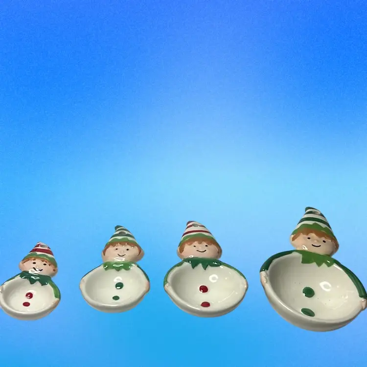 4 Piece “Holiday Time” Ceramic Elf Measuring Spoons.