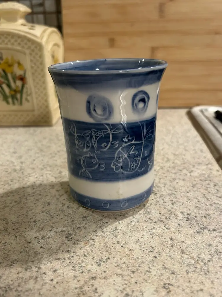 Handcrafted Blue and White Ceramic Mug with Fish Motif