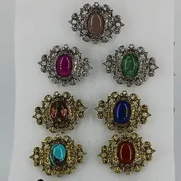 Eight Gemstone Brooches/Pins