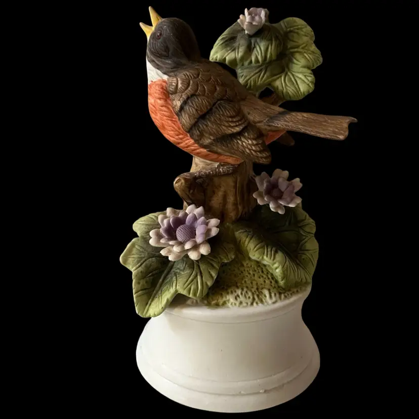 Vintage Royal Crown Porcelain Robin Figurine Music Box 7”H x 5”. “I’d Like To Teach The World To Sing”
