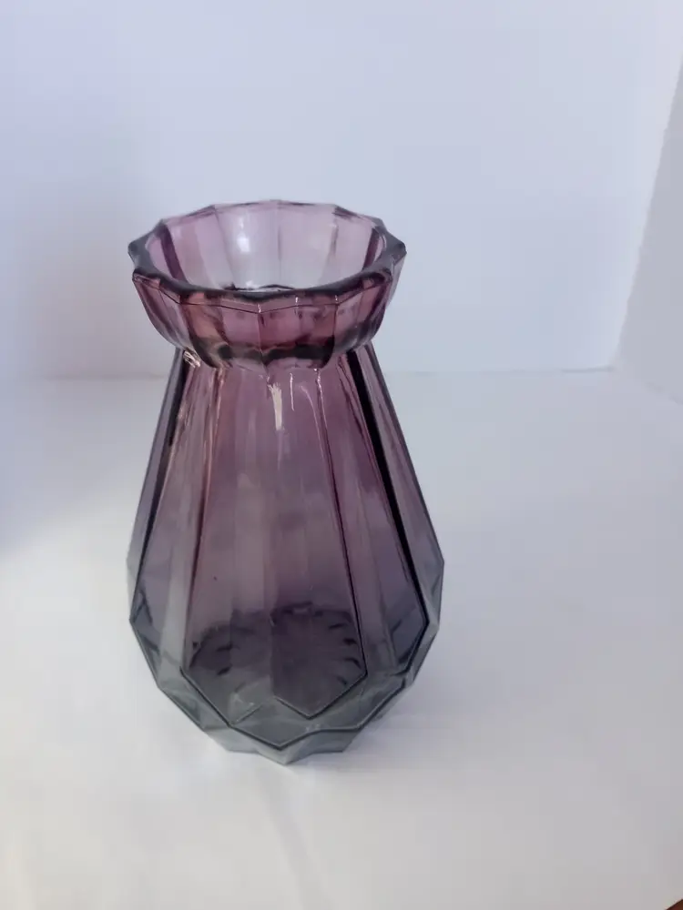Pretty glass vase 6 in tall purple in color