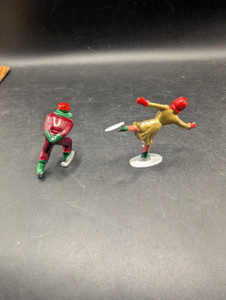 Vintage Set of 2 Barclay Type Metal Hand Painted Skaters Boy and Girl.