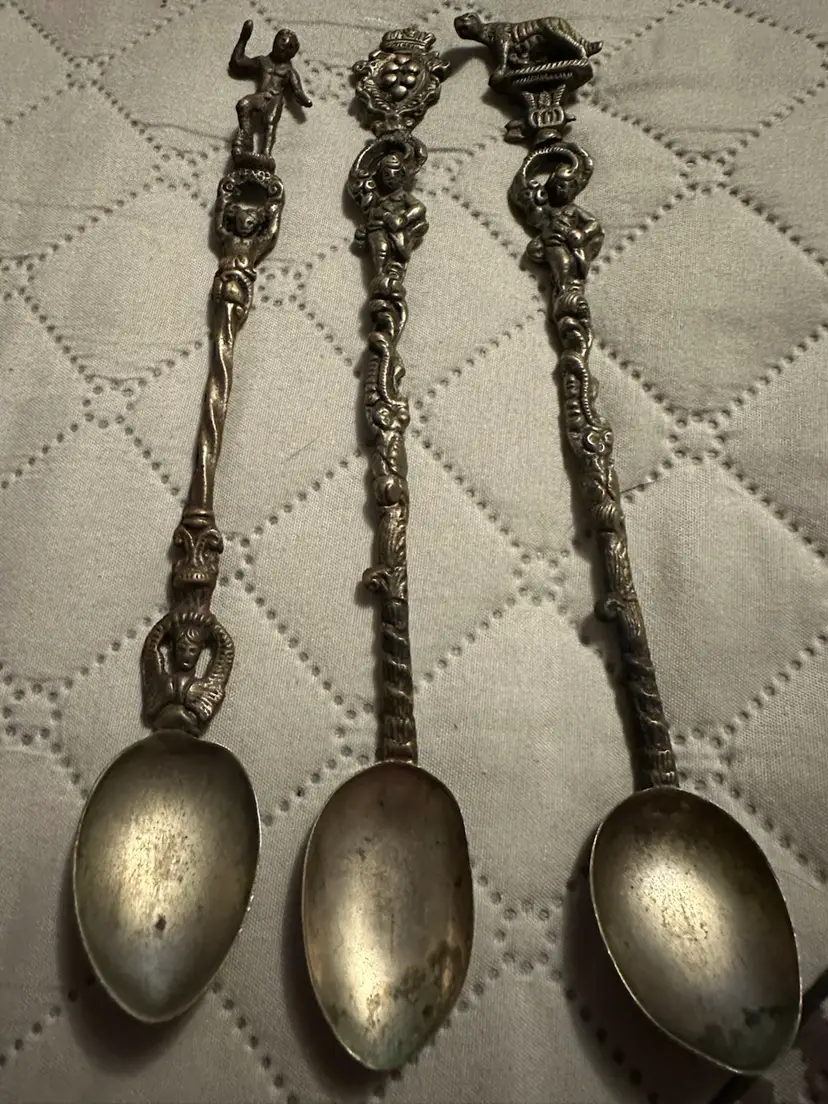 Italian silverplate decorative spoons with figural handles. Set Of 3