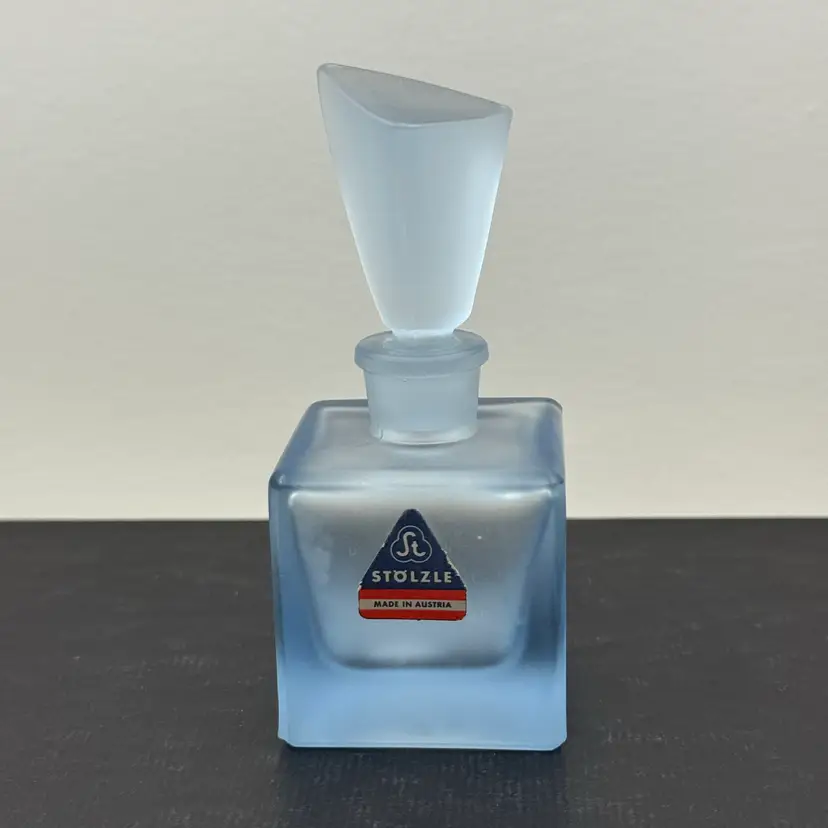 Frosted Austrian glass perfume bottle with a unique stopper by Stolzle, Glows Green