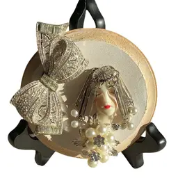 4” Round Plaque Lady With pearls And Bling Bow Made By Me With Pieces Of Jewelry