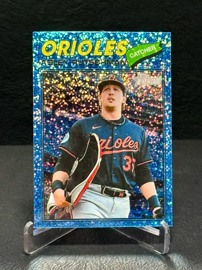 Adley Rutschman 2026 Topps Heritage #180 Chrome Blue Sparkle Refractor Baltimore Orioles