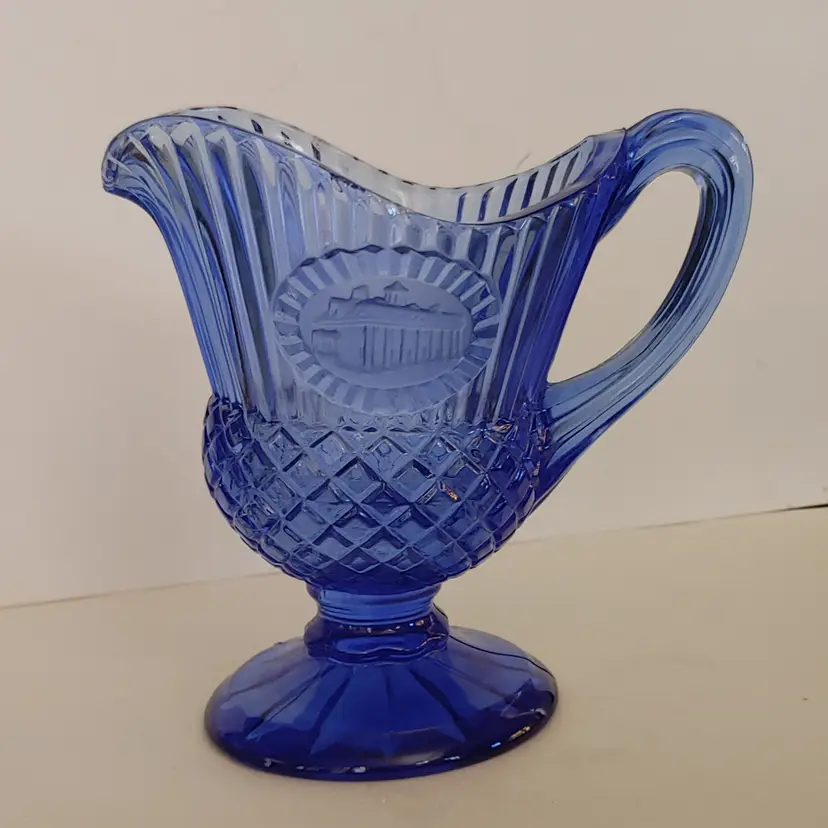 #01 Fostoria for Avon creamer pitcher. Cameo of Mount Vernon. Has a chip/flea bites. See pics. 5.5 inches high.